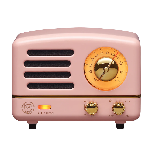 pink radio with white buttons